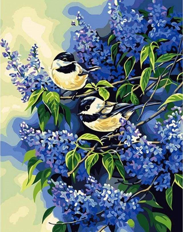Two birds on a Lilac branch